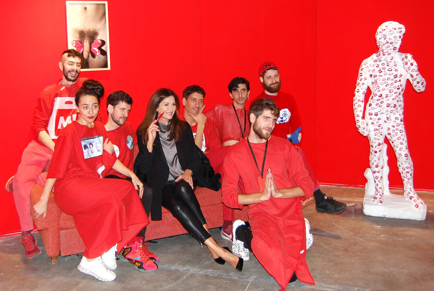 Andrea Frigerio with the artists of Buenos Aires's UV at ArteBA. Photo by Sarah Cascone.