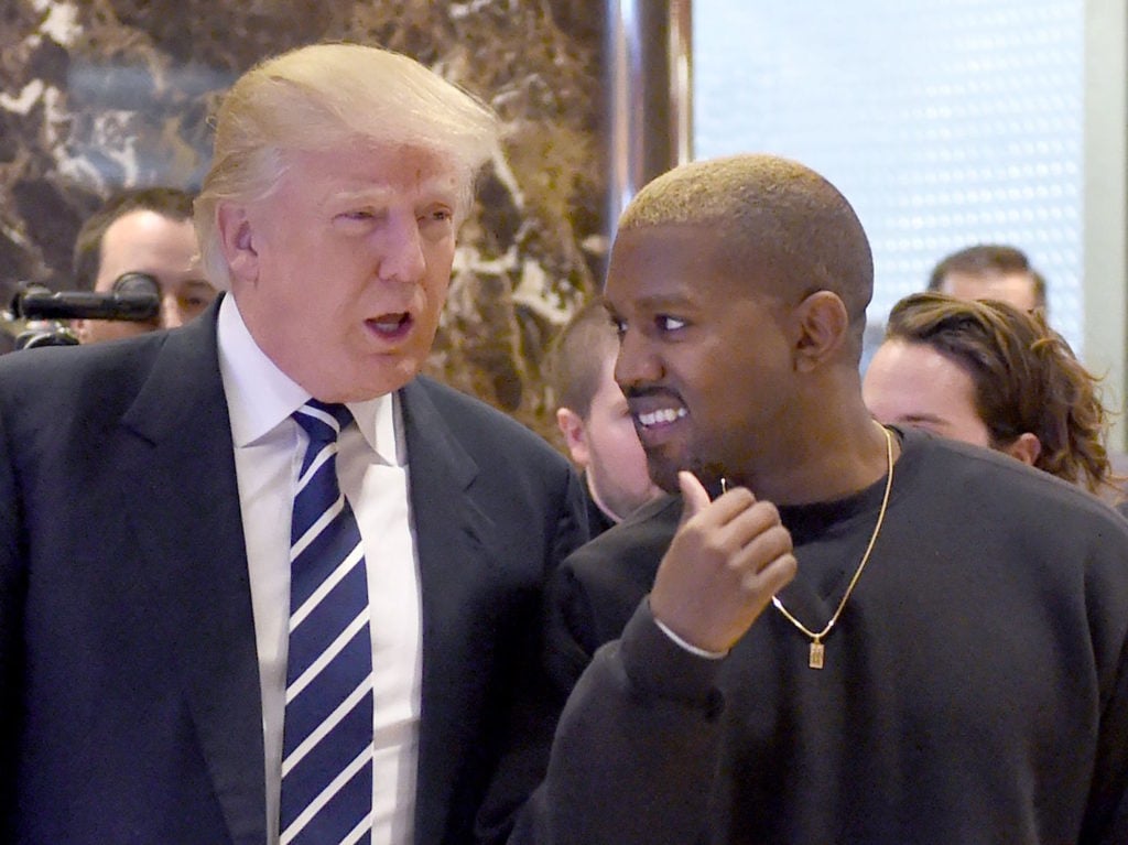 Kanye West and Donald Trump. Photo courtesy of Timothy A. Clary/AFP/Getty Images.