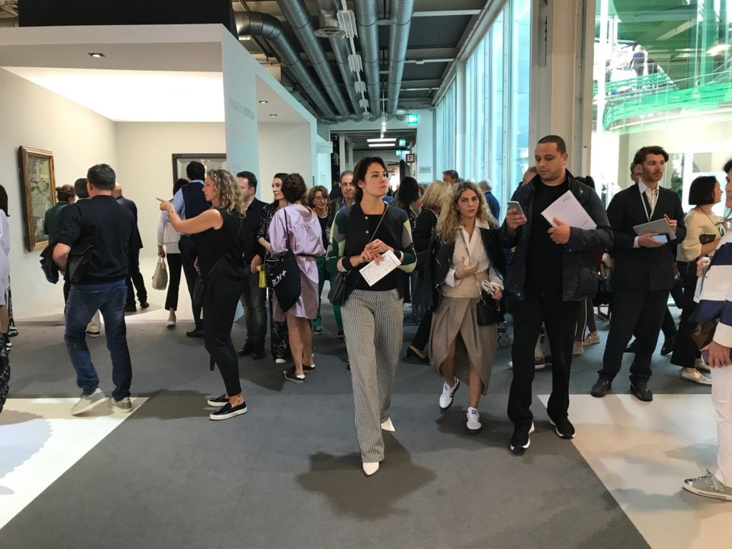 The upper floor at Art Basel 2018 on opening day. Image courtesy Tim Schneider.