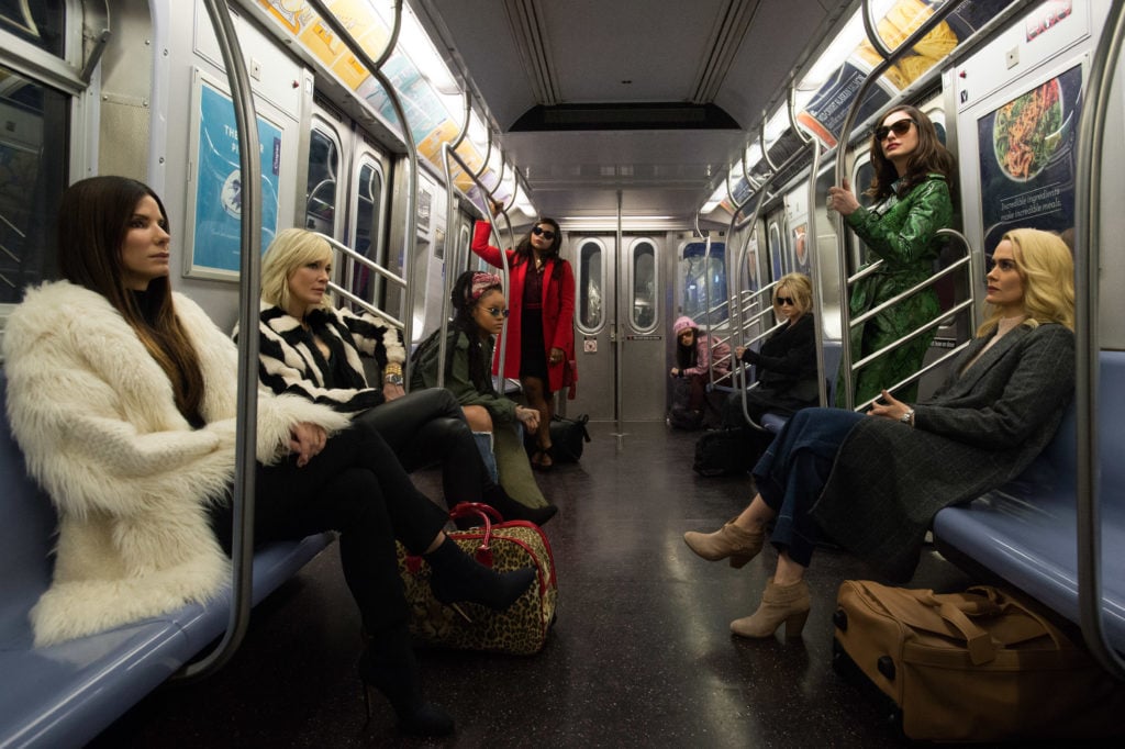Sandra Bullock as Debbie Ocean, Cate Blanchett as Lou, Rihanna as Nine Ball Mindy Kaling as Amita, Awkwafina as Constance, Anne Hathaway as Daphne Kluger, and Helena Bonham Carter as Rose, and Sarah Paulson as Tammy in Warner Bros. Pictures' and Village Roadshow Pictures' Ocean's 8. Film still courtesy of Barry Wetcher ©2018 Warner Bros. Entertainment Inc.
