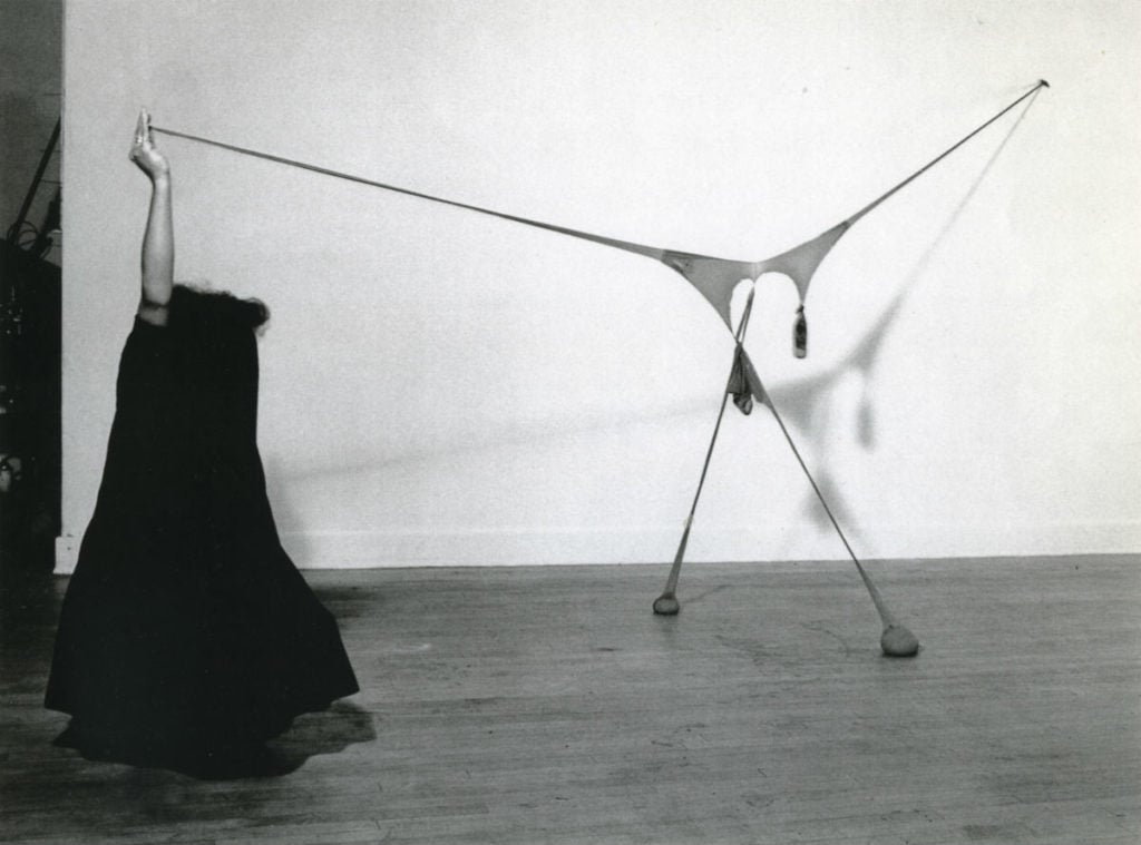 Senga Nengudi. "Studio performance with R.S.V.P." 1976. Black and white photograph. Photographer: Ken Peterson. Courtesy of the artist; Thomas Erben Gallery, New York; and Lévy Gorvy, New York, London.