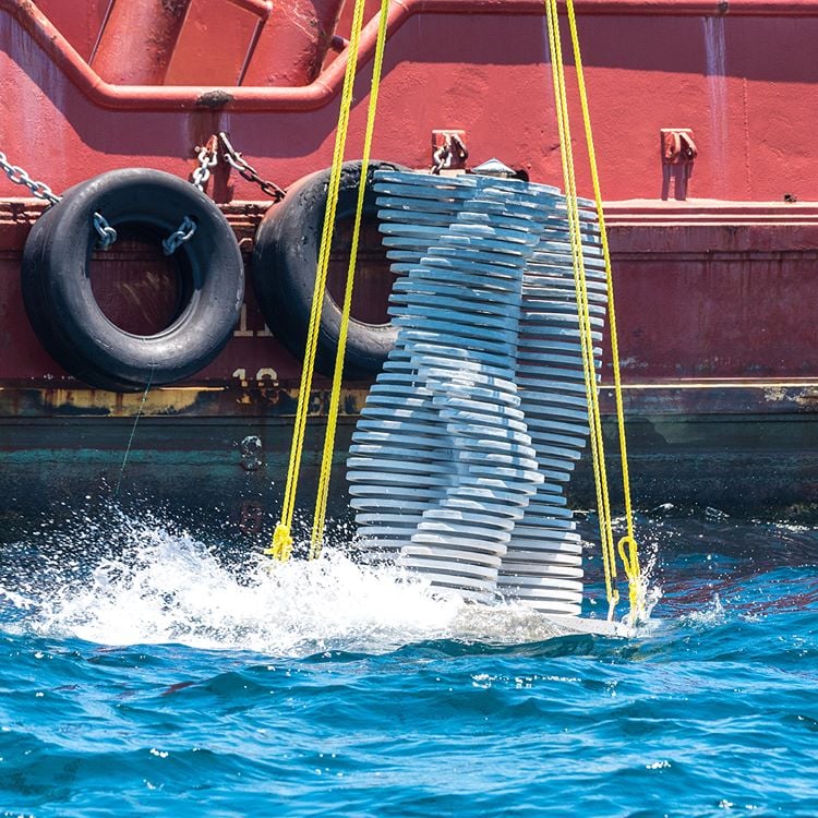 Marek Anthony, Propeller in Motion being installed at the Underwater Art Museum. Photo courtesy of the Underwater Art Museum.