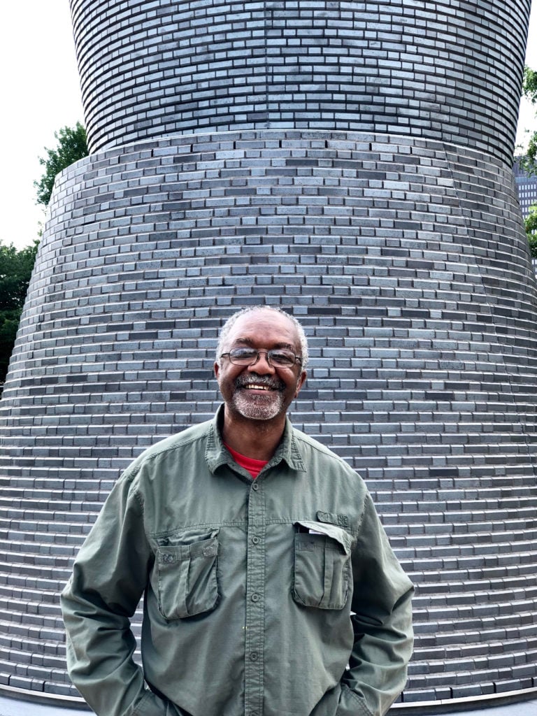 Kerry James Marshall with A Monumental Journey. Photo courtesy of the Greater Des Moines Public Art Foundation.