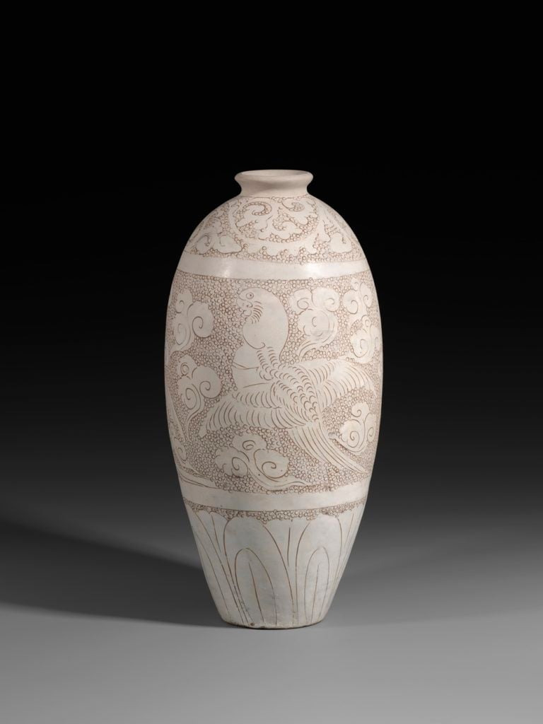 A large engraved white-glazed Cizhou Meiping. Northern Song Dynasty, (A.D. 11th Century). Image courtesy of J. J. Lally & Co., New York. Photo: Oren Eckhaus.