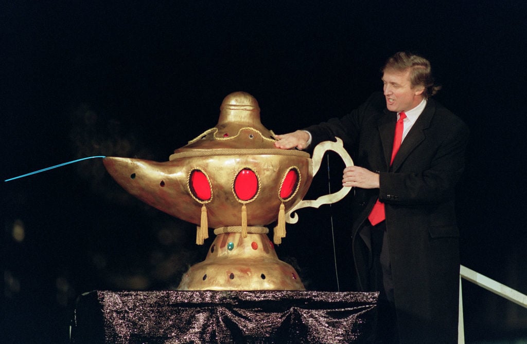 Donald J. Trump at the opening ceremony for the Trump Taj Mahal casino, in Atlantic City, 1990. Photo: Bill Swersey/AFP/Getty Images.