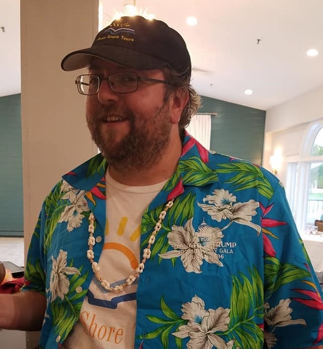 Atlantic City Trump Museum Project founder Levi Fox, wearing a Hawaiian shirt from the collection that commemorates Trump's 50th Birthday Gala at the Trump Taj Mahal in 1996. Image courtesy of Levi Fox.