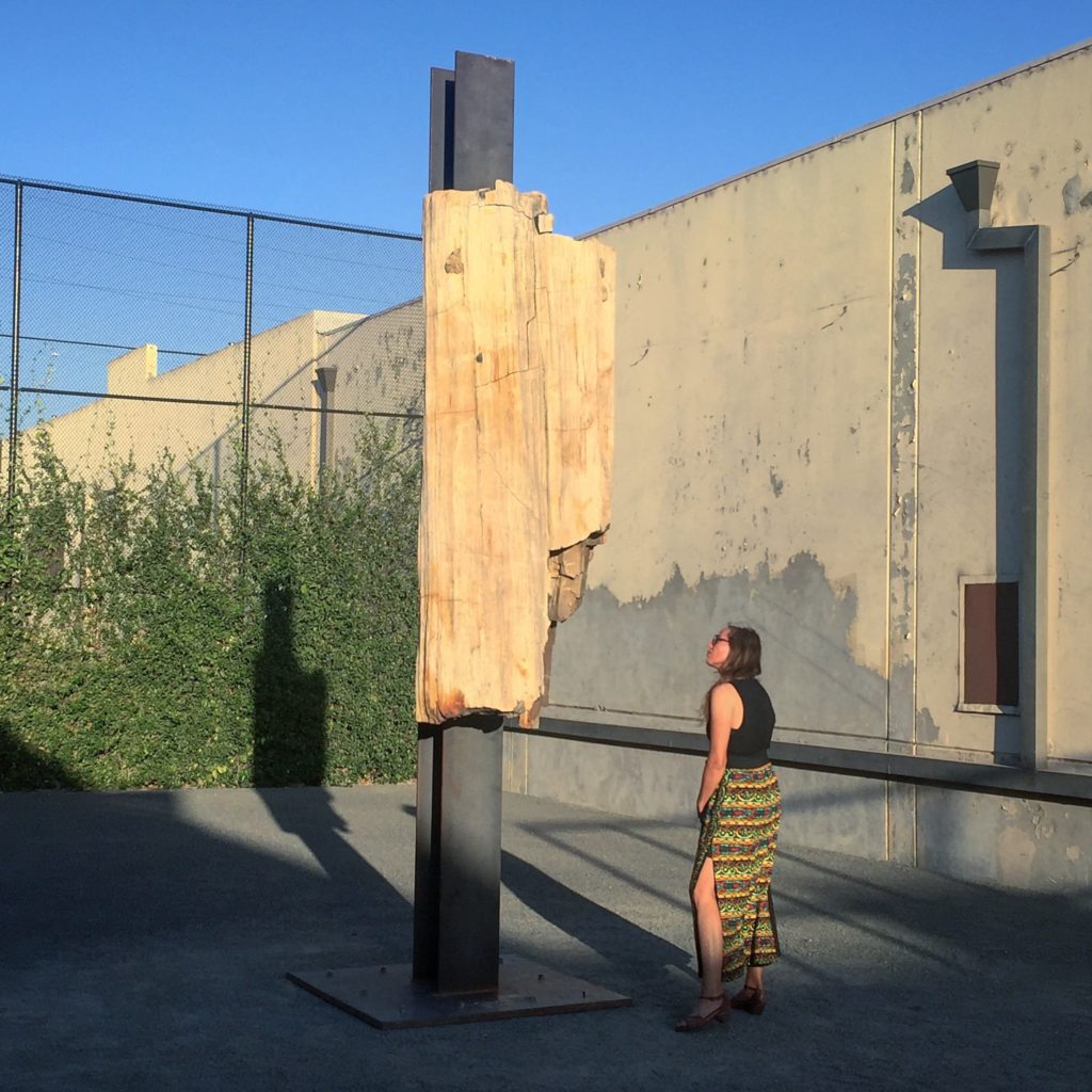 Carol Bove, <i>Love Fashions the Sidereal Body of the One in the Image and Likeness of the Other</i>, 2014, in the courtyard of Maccarone Los Angeles, now one of the few remaining galleries in Boyle Heights. Photo by Tim Schneider. 