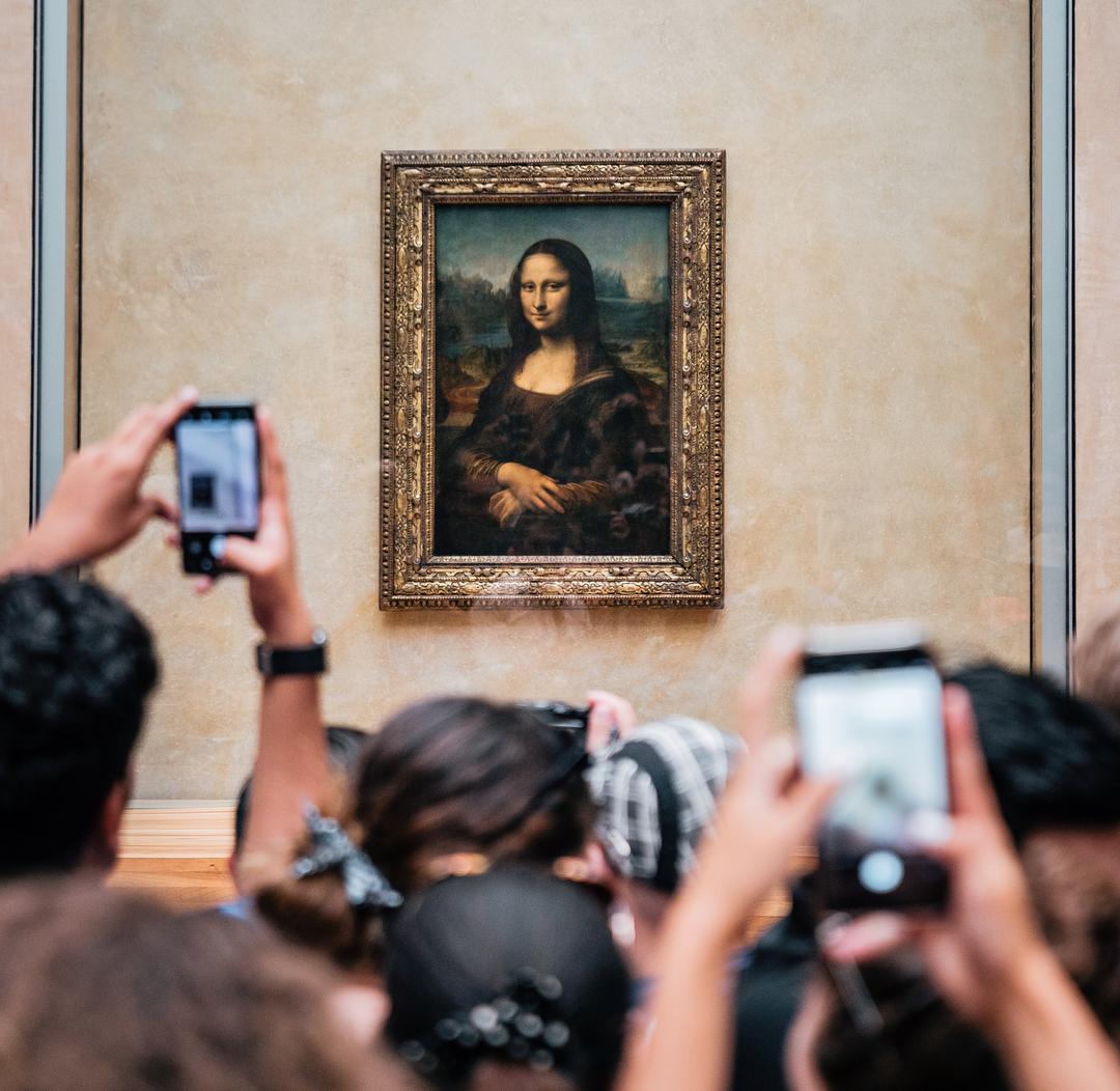 Mona Lisa Attacked in Louvre With Cake By Man Wearing Wig