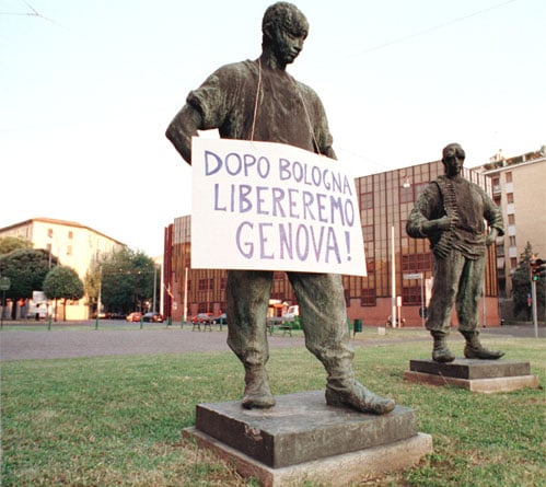 A public intervention by Luther Blissett, putting signs around monuments in Italy to encourage participation in the 2001 Genoa anti-globalization protests. Image courtesy Wu Ming Foundation. 