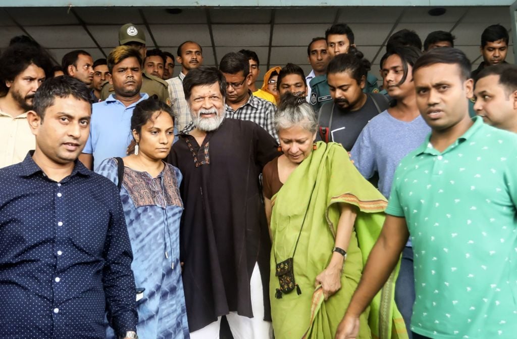 Renowned Bangladeshi photographer Shahidul Alam (front third from left), 63, is seen in a hospital in Dhaka on August 8, 2018. Photo courtesy AFP/Getty Images.