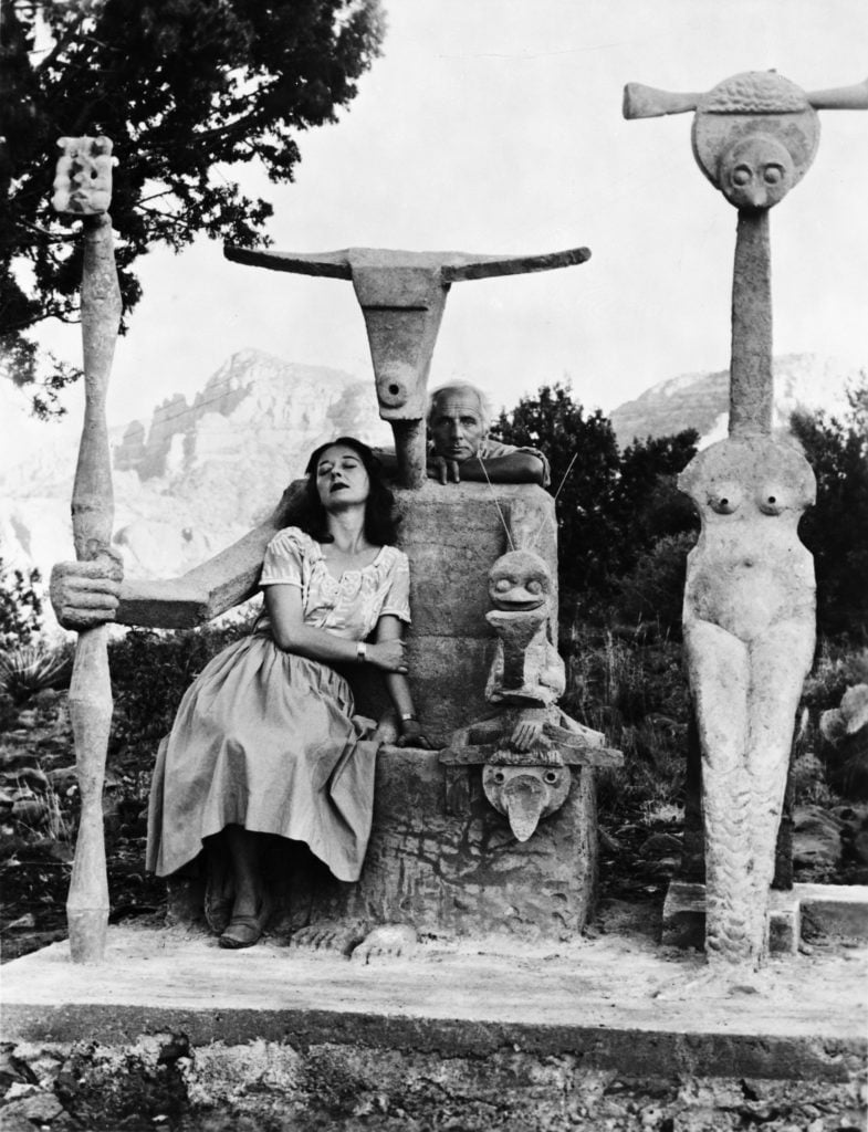 Dorothea Tanning and Max Ernst with his sculpture, Capricorn (1947). © John Kasnetsis.