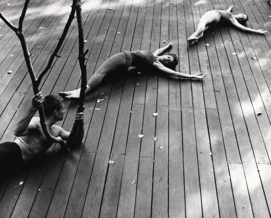 Photo by Warner Jepson. Anna Halprin, <em>The Branch</em> (1957). Performed on the Halprin family’s Dance Deck, Kentfield, California, 1957. Performers, from left: A. A. Leath, Anna Halprin, and Simone Forti. Courtesy of the Estate of Warner Jepson.