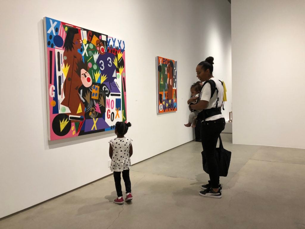 Naima Keith and her kids at an art show. Photo courtesy of Naima Keith.