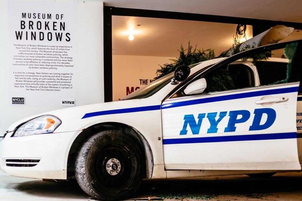 Jordan Weber's police car sculpture at the Museum of Broken Windows. Photo courtesy of the NYCLU.