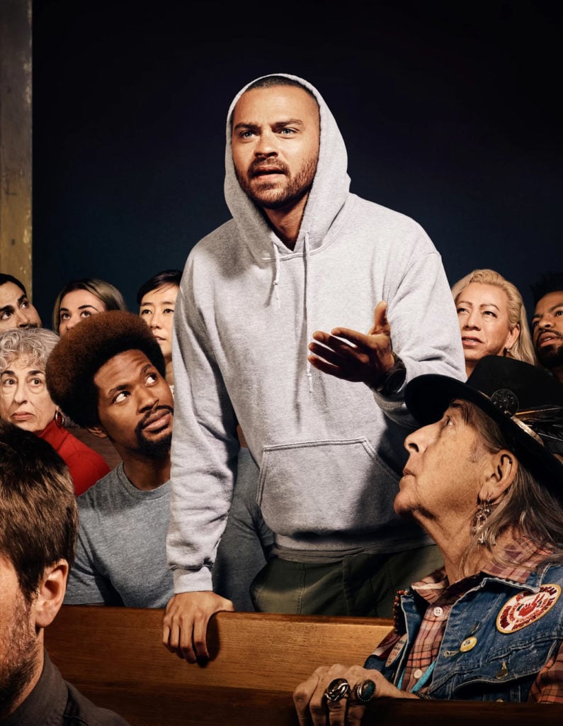 For Freedom's interpretation of Norman Rockwell’s Freedom of Speech, featuring actor and activist Jesse Williams (standing). Photo courtesy of For Freedoms.