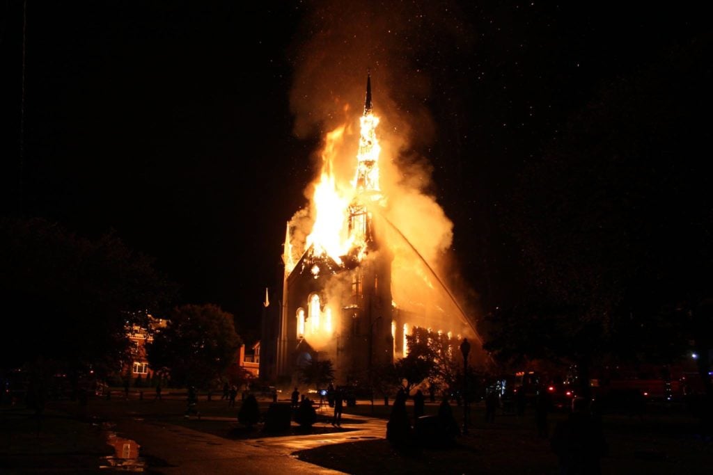 The First Baptist Church in Wakefield, Massachusetts, on fire. Photo courtesy of Trevor Hardy via Facebook.
