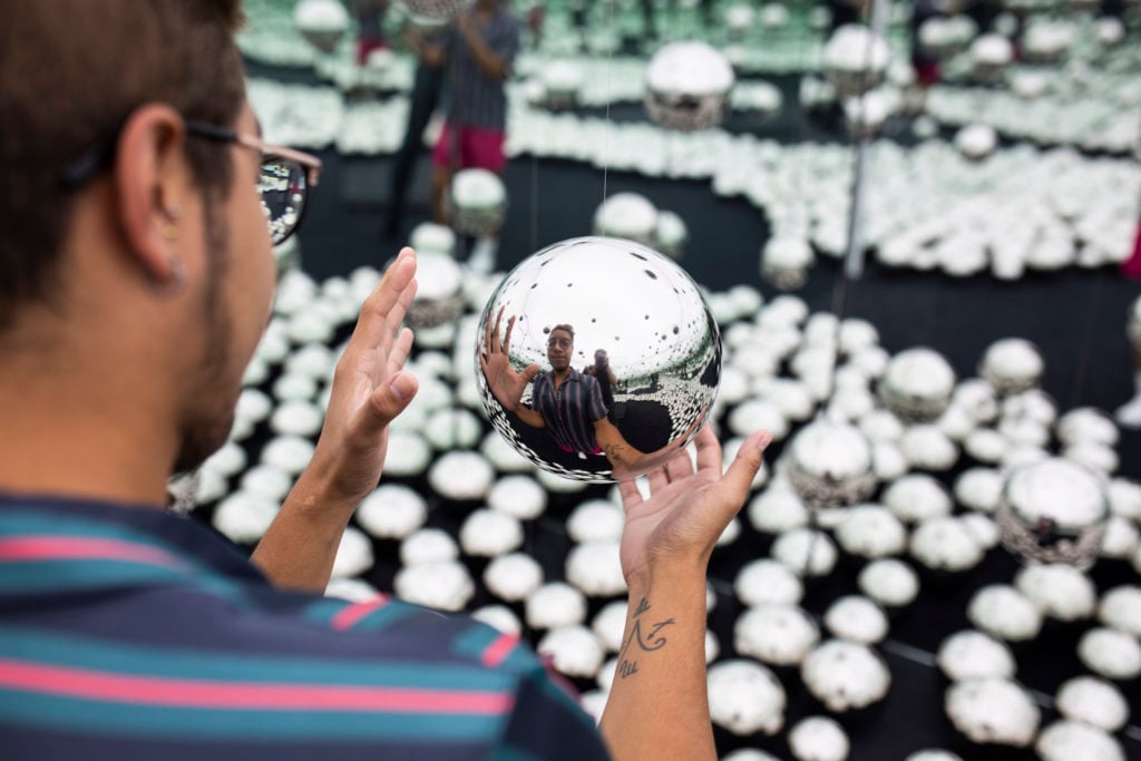 Yayoi Kusama, <em>INFINITY MIRRORED ROOM: LET'S SURVIVE FOREVER</em> (2017) at the wndr museum. Photo courtesy of the wndr museum. 
