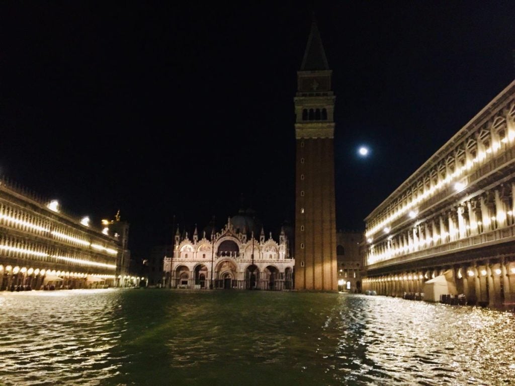Venice's Piazza San Marco flooded at night. Photo courtesy of Venice's mayor, Luigi Brugnaro, via Twitter.