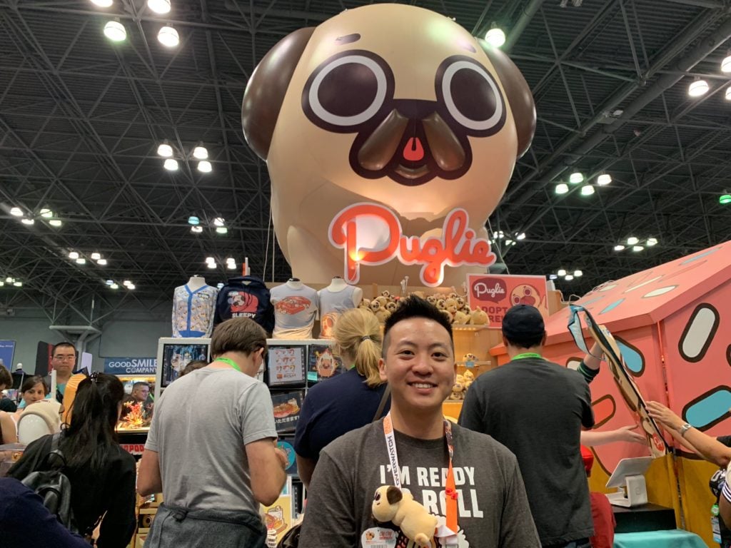Artist Euge and his booth for Puglie Pug at New York Comic Con. Photo by Sarah Cascone.