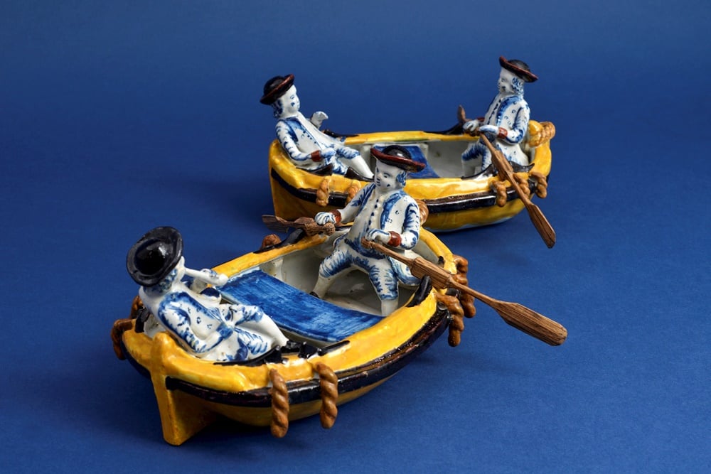 Delftware <i>Pair of Polychrome Groups of Two Gentlemen in a Boat</i> Courtesy Aaronson Antiquairs