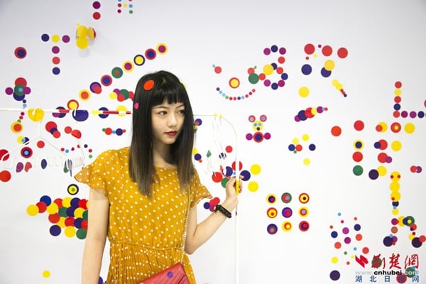 A Chinese news site featured these photographs of an alleged Yayoi Kusama and Takashi Murakami exhibition in Wuhan. The works resemble Kusama's aesthetic, but the artist's lawyer alleges that there has been a rash of counterfeit shows of the two artists in China this year.
