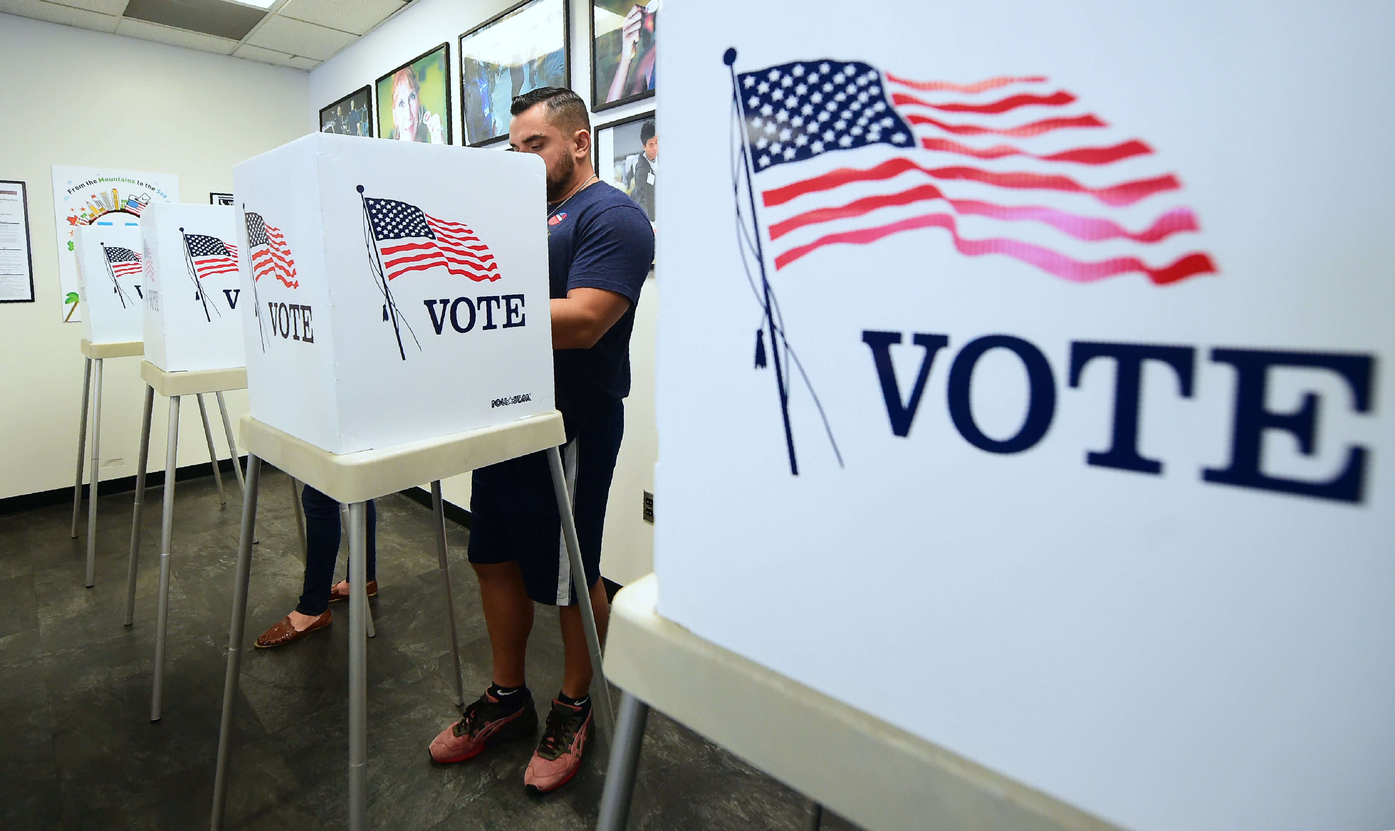 Voters cast their ballots. Photo by Frederic J. Brown/AFP/Getty Images.