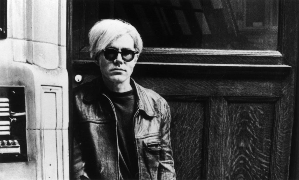 Pop artist and film-maker Andy Warhol. Photo by Express Newspapers/Getty Images.