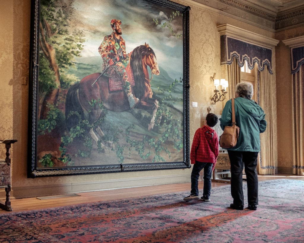 Visitors looking at Kehinde Wiley's Equestrian Portrait of Philip IV (2017). Courtesy of the Philbrook Museum of Art.