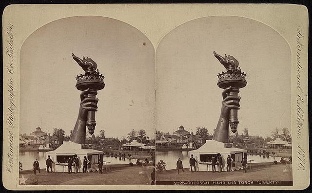 The torch and part of the arm of the Statue of Liberty on display at the 1876 World's Fair, or Centennial Exhibition, in Philadelphia. Photo courtesy of the via Library of Congress