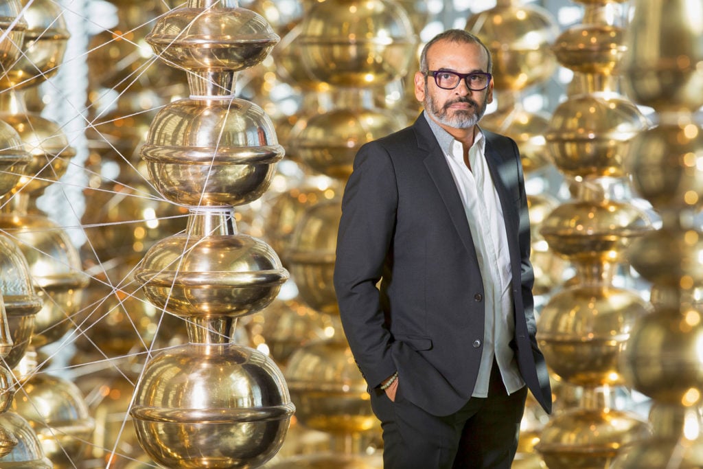 Subodh Gupta at his exhibition “Guests, Strangers and Interlopers” at the SCAD Museum of Art in Savannah. Photograph by John McKinnon, courtesy of the SCAD Museum of Art.
