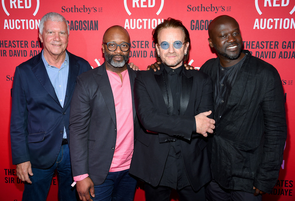 Larry Gagosian, Theaster Gates, Bono, and David Adjaye attend The (RED) Auction with Theaster Gates, Sir David Adjaye and Bono, in collaboration with Sotheby's and Gagosian at The Moore Building on December 5, 2018 in Miami, Florida. (Photo by Dimitrios Kambouris/Getty Images for The (RED) Auction 2018)