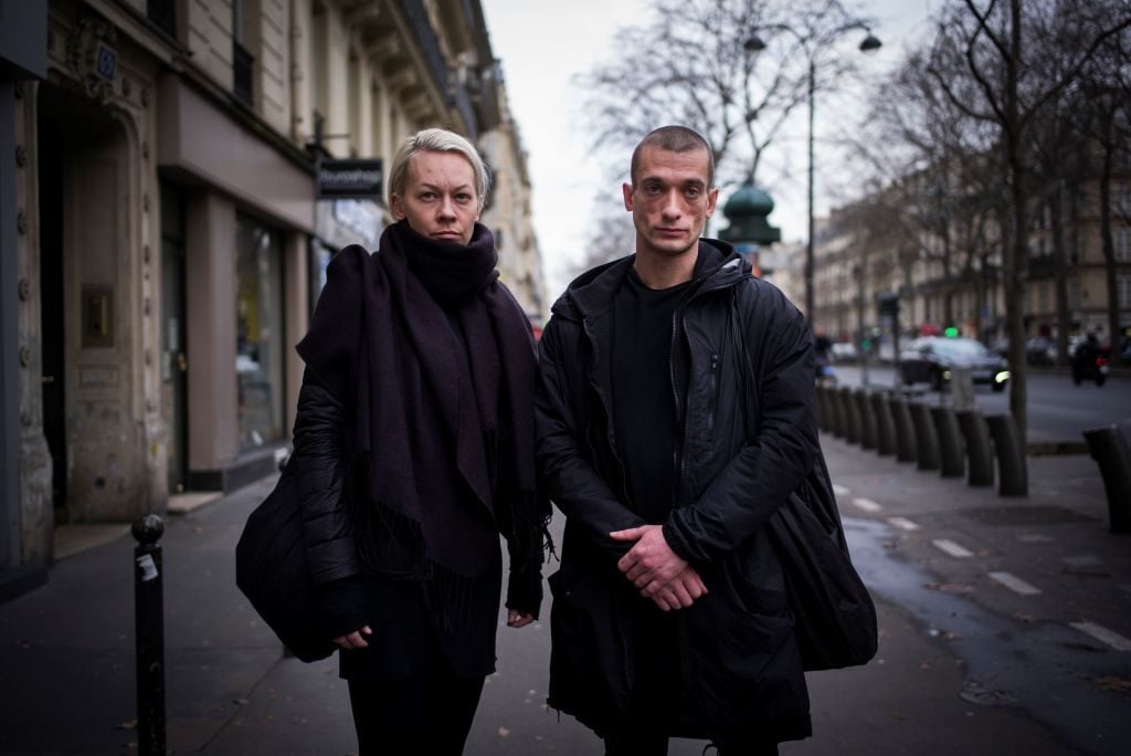 Pyotr Pavlensky and Oksana Shalygina in 2017 in Paris. Photo by Martin Bureau/AFP/Getty Images.