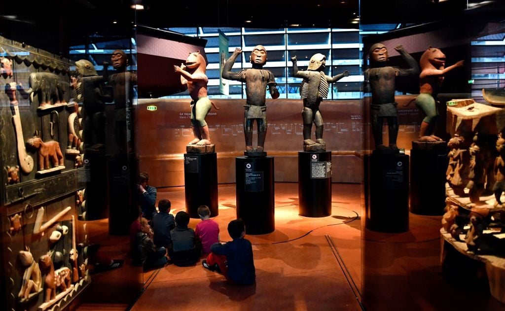Large royal statues from the kingdom of Dahomey,Benin dating to 1890–92 at the Musée du Quai Branly, Paris. Photo: Gerard Julien/AFP/Getty Images.