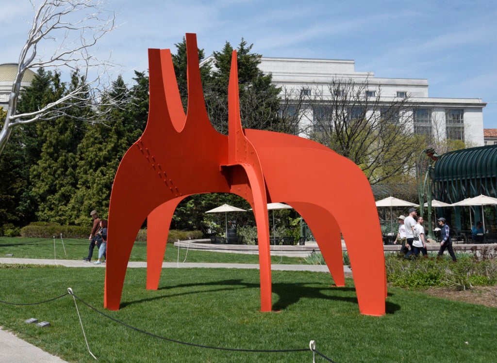 Alexander Calder's <i>Cheval Rouge (Red Horse)</i> on display in the National Gallery of Art Sculpture Garden in Washington, D.C. Photo by Robert Alexander/Getty Images.