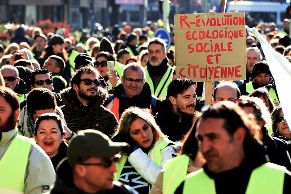 Yellow Vest protestors march in Marseille on January 5, 2019, during a rally by yellow vest 