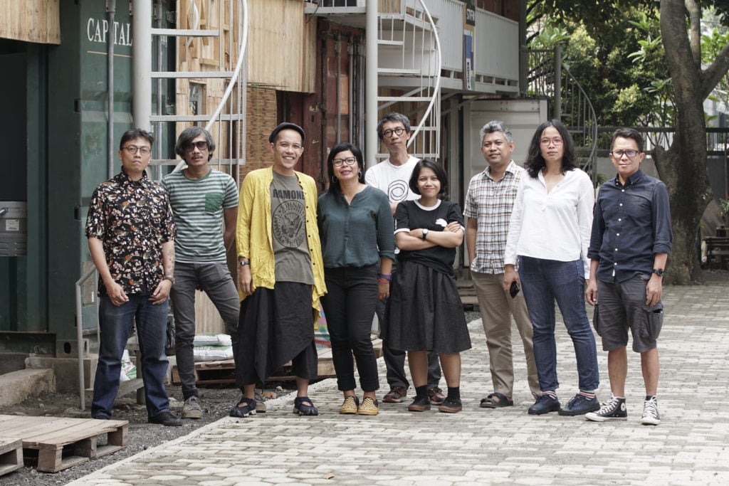 Art collective Ruangrupa standing together