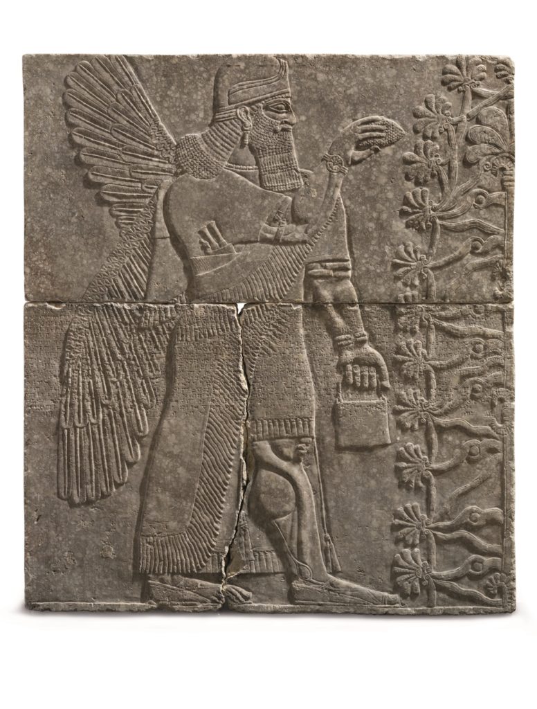 An Assyrian gypsum relief of a winged genius, Reign of Ashurnasirpal (circa 883-859 B.C.). Image courtesy of Christie's. 