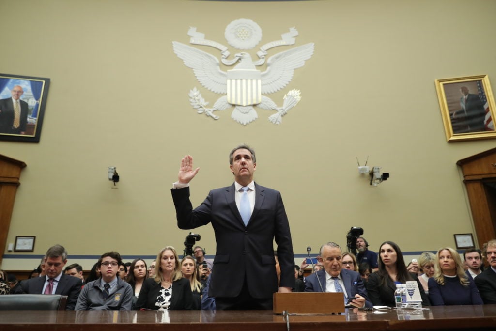 Michael Cohen, former attorney and fixer for President Donald Trump, being sworn in before testifying in front of Congress on February 27, 2019. Photo by Chip Somodevilla/Getty Images.