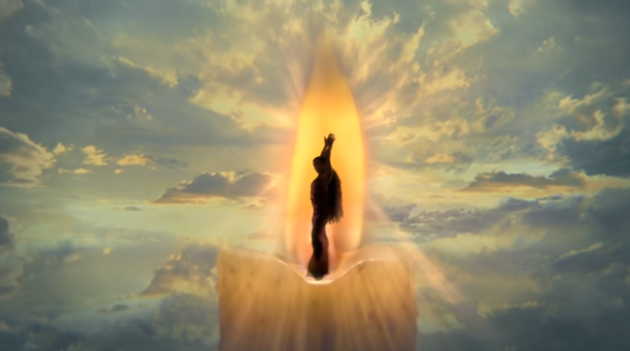 The scene from Ariana Grande's music video for "God Is a Woman" that resembles Vladimir Kush's painting The Candle and The Candle 2. Screenshot via YouTube.