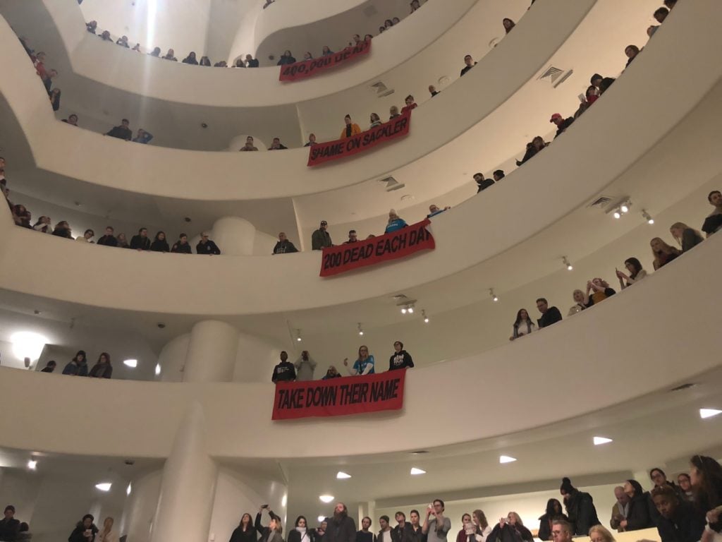 Sackler P.A.I.N.'s protest at the Guggenheim Museum. Photo by Caroline Goldstein. 