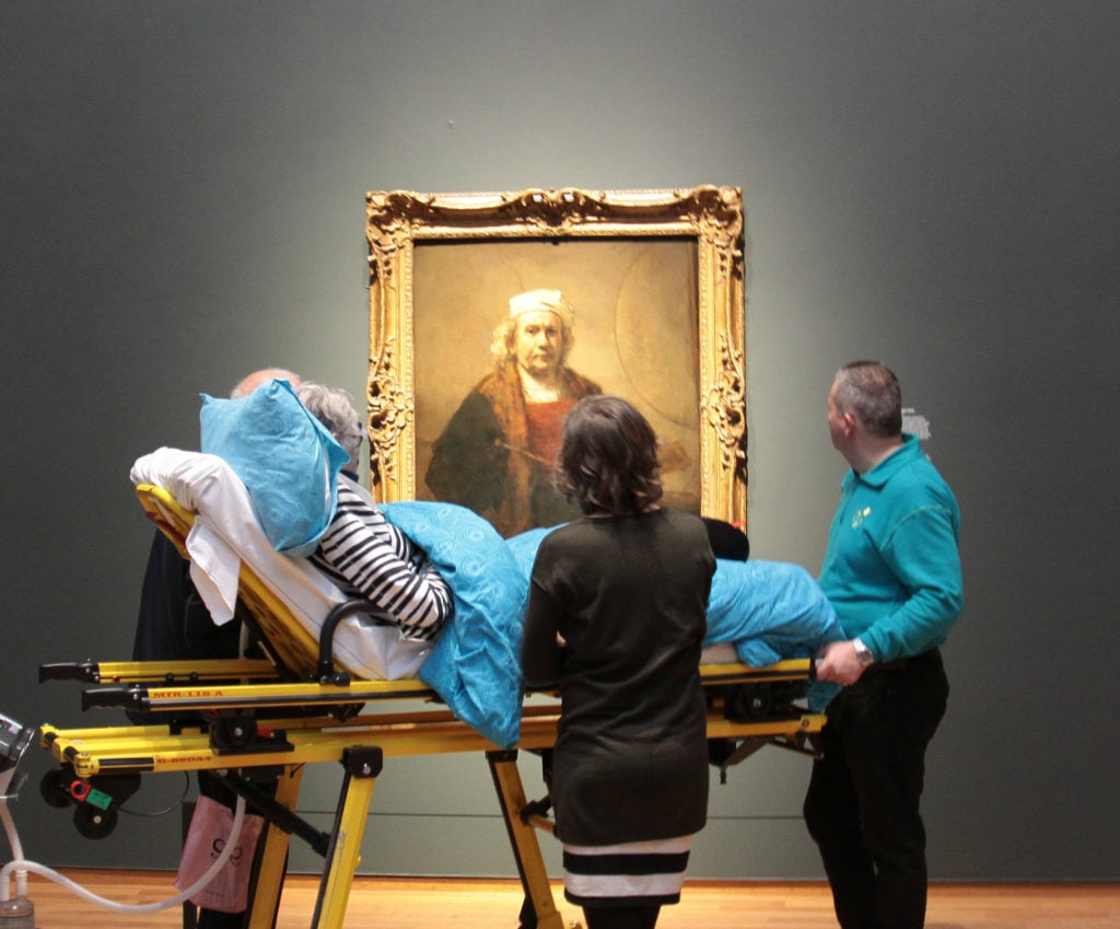 A terminally ill patient visits "Late Rembrandt" at the Rijksmuseum in 2015. Photo courtesy of the Ambulance Wish Foundation. 