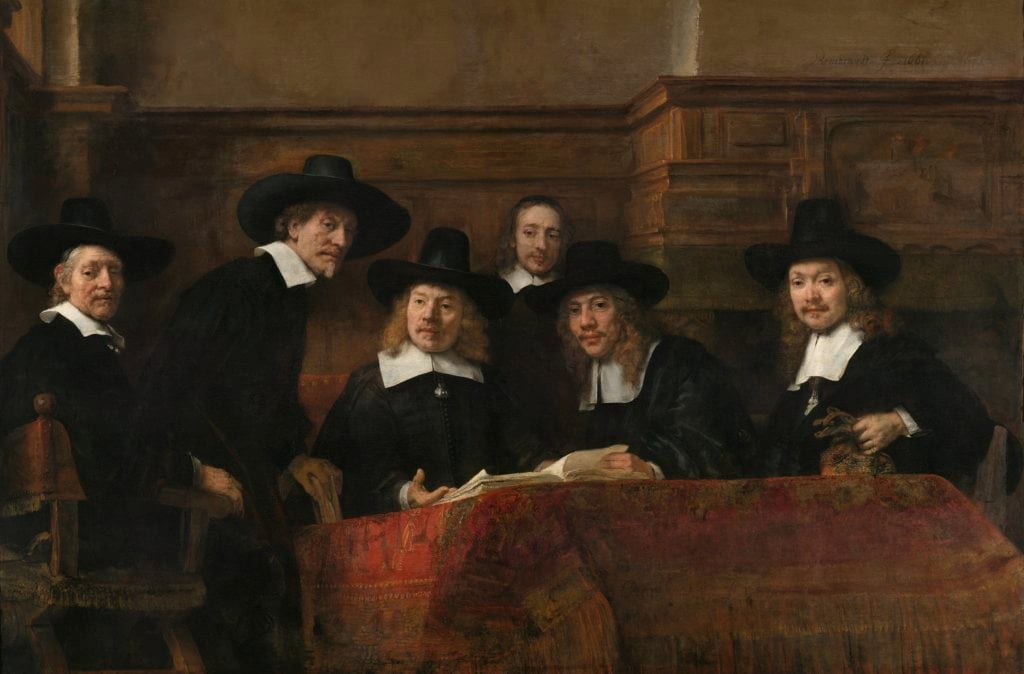 Rembrandt van Rijn, <i>The Wardens of the Amsterdam Drapers’ Guild</i>(1662). Known as <i>The Syndics</i>. Courtesy the Rijksmuseum.