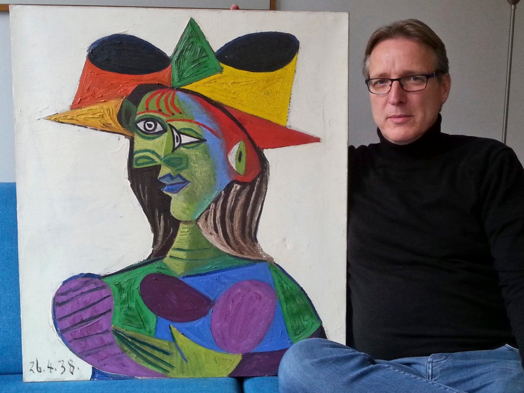 Dutch art detective Arthur Brand with Pablo Picasso's Buste de Femme, a portrait of Dora Maar stolen in 1999 and now recovered by the investigator. Photo by Tetteroo courtesy of Arthur Brand.