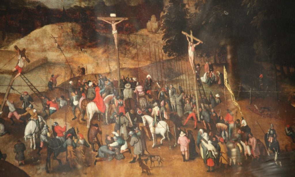The Crucifixion by Pieter Brueghel the Younger was lifted from a church in northern Italy on Wednesday.