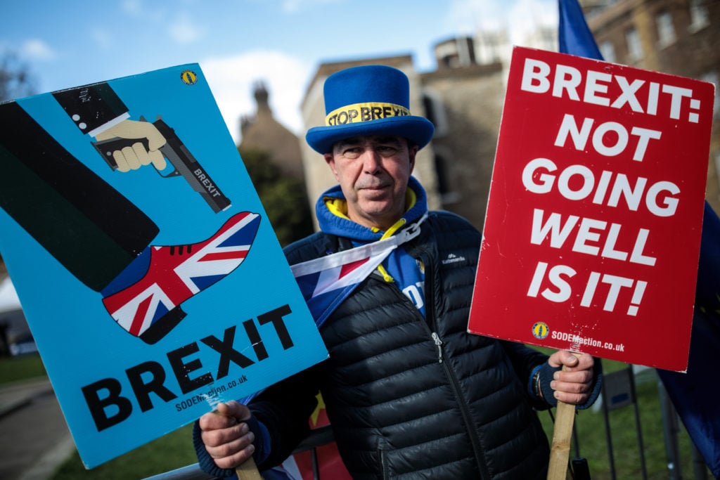 An anti-Brexit protester demonstrates outside the House of Parliament in London, England. Photo by Jack Taylor/Getty Images.