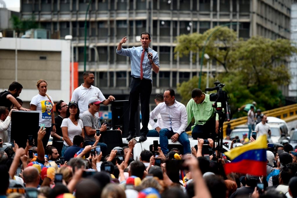 Venezuelan opposition leader and self-proclaimed acting president Juan Guaidó speaks during a protest in the fifth day of a crippling power blackout, in Caracas on March 12, 2019. Photo: Federico Parra/AFP/Getty Images.
