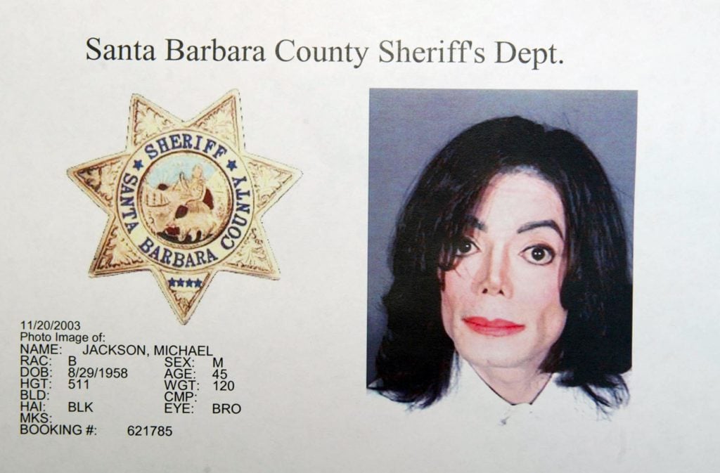 Handout image of Michael Jackson's mug shot after he was booked on multiple counts for allegedly molesting a child in Santa Barbara, California in 2003. Photo by Frazer Harrison/Getty Images.