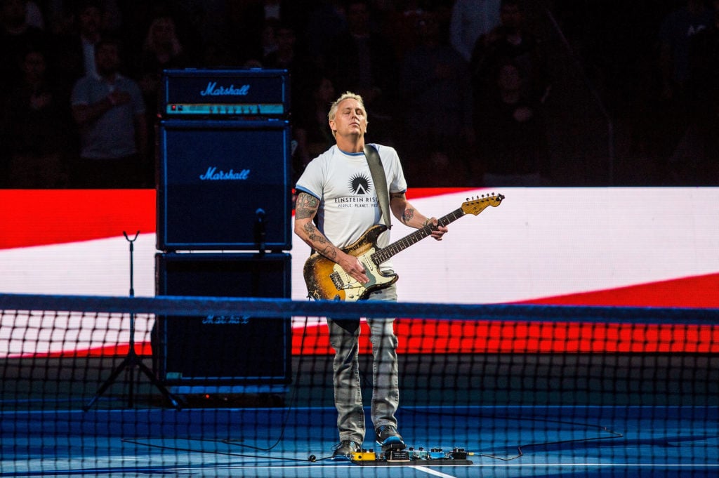 Musician Mike McCready plays the United States national anthem at the Match For Africa 4 exhibition match at KeyArena on April 29 2017 in Seattle Washington Photo by Suzi PrattGetty Images