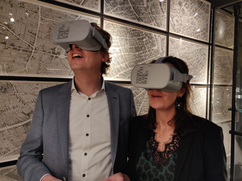 Visitors to TEFAF experience a VR experience from Daniel Crouch Rare Books. Photo courtesy of Richard Duffy, RBD Design. 