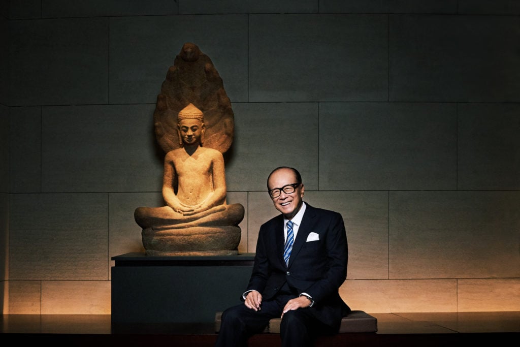 Li Ka-shing at the unveiling of Tsz Shan Monastery's Buddhist Art Museum with a Seated Buddha Protected by the Nāga King from Cambodia Khmer Empire (circa 12th to 13th century). Photo courtesy of CK Hutchison Holdings Limited.